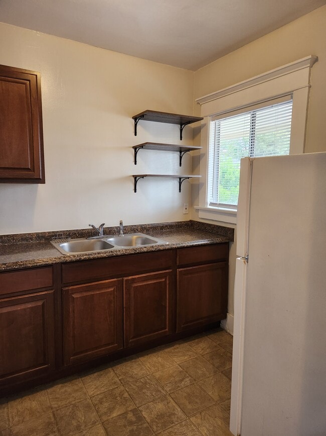 Newer kitchen with window - 3631 E 8th St Unit A