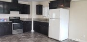 Photo - 1230 E 33rd St Townhome