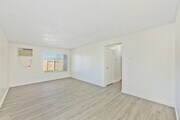 3BR, 2BA - 1,100SF - Living Room - Springbrook Park Apartments