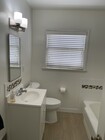 Bathroom with separate tub - 10785 Wilkins Ave Unit 10785 Wilkins