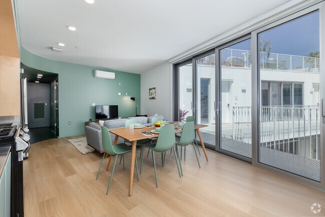 4BD, 3BA - 1,070SF - Living Room - Comma Barrington