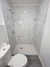 Photo - 635 W 51st St Apartment Unit three quarters