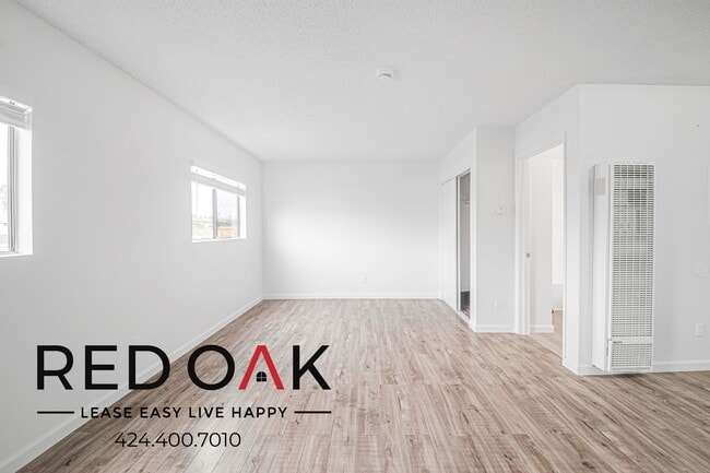 Building Photo - 706 McDonald Ave Unit 213