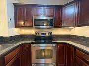 Photo - Upgraded Condo with Private Patio, AC, Pool, Gym, and Covered Parking in Gated Community
