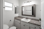 2BR, 2BA - 950SF - Primary Bathroom - Chaumont Villas Apartments