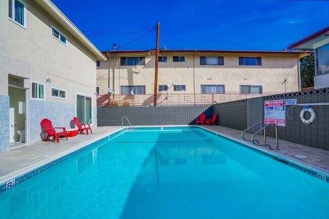 Photo - Retro Style Apartment Building with Pool a...