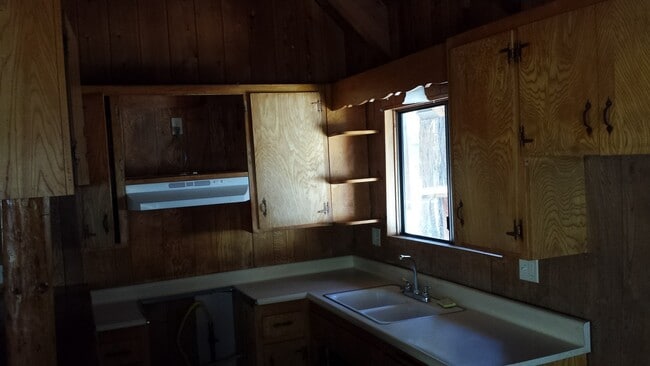 Photo - Rustic three bedroom with large lot.