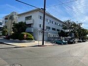 Newer garage doors. - 7617 De Longpre Ave Apartments Unit 1