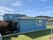 Building and gated yard - 4138 Redondo Beach Blvd Apartments Unit A