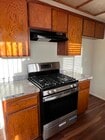 New Stove and Countertops - 14025 Chadron Ave Apartments