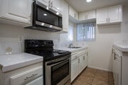 1BR/1BA with stainless steel appliances - Country Squire Apartments