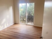 Living room and balcony - 3110 Carlyle St Apartments Unit 3108.75