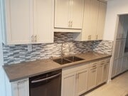 Kitchen cabinets, backsplash and countertops - 11946 Dorothy St Apartments Unit 2