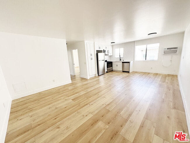 Building Photo - 5440 Carlton Way Unit 207 Rental