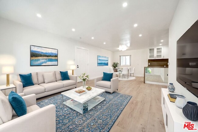 Building Photo - 9005 Cynthia St Unit 412