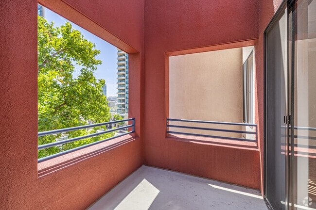 1BR, 1BA - 786SF - Balcony - 600 Front Apartments