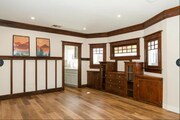Beautiful Cabinetry in the Living Room. - 3206 Darwin Ave Apartments Unit 3206