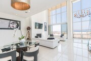Living Room and Dining Area - 5205 Ocean Front Walk Condo Unit 203