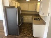 Photo - Beautiful Townhome with large fenced back patio, second story balcony, and two covered parking spots