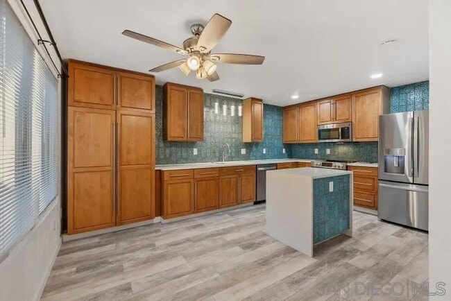 Building Photo - 3755 Udall St Unit 205