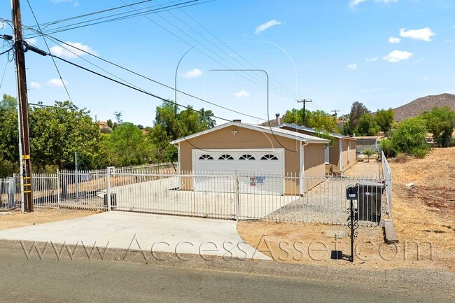 Photo - Spacious 3 Bedroom Home with Large Fenced Yard and Two-Car Garage