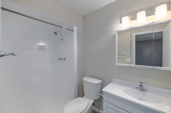 2BR, 1BA - 1,150SF - Bathroom - Camelot Apartments