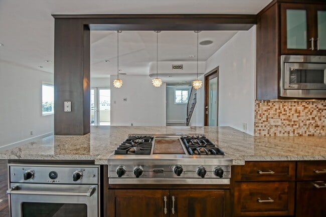 Photo - BEAUTIFULLY REMODELED & BRIGHT 2-STORY APARTMENT W/ OCEAN & PIER VIEWS, BALCONY & 2-CAR PARKING I... Unit C