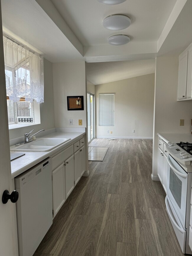 kitchen from garage entry - 4184 Breezy Glen Dr