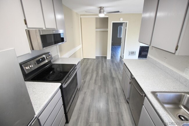 Building Photo - 10332 Caminito Aralia Unit 110