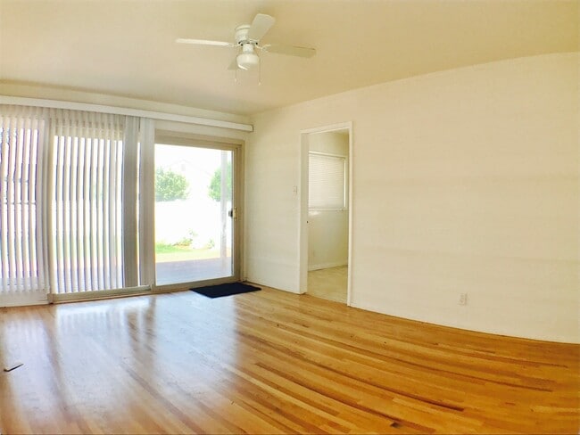 Photo - Minutes drive to the beach Hardwood flooring all throughout Large Deck with a Yard
