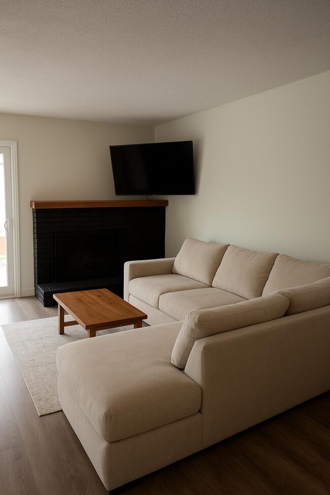 Living room with fireplace - 334 Calor Dr