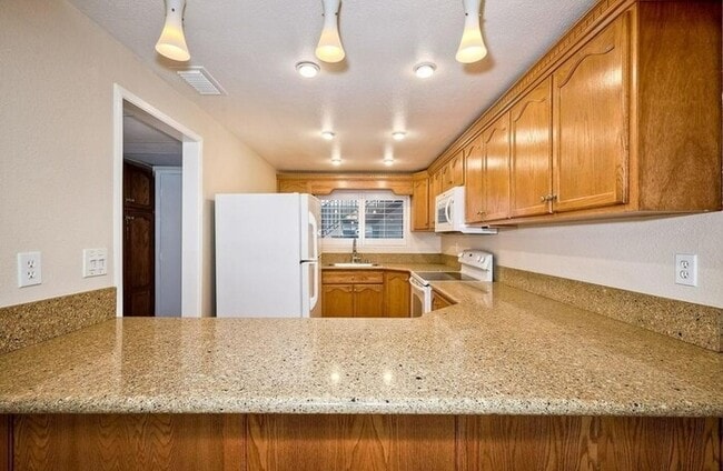 Photo - First-Floor 2BR Condo with Pool Access & Covered Parking in La Bonita Unit 107