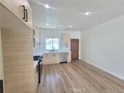 Photo - 16840 Los Alimos St Townhome