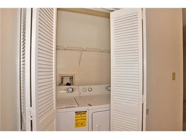 Building Photo - 7405 Charmant Dr Unit 2103