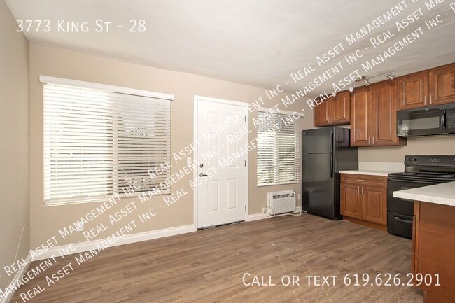 Building Photo - 3773 King St Unit 28
