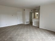 Living Room looking toward front door and kitchen - 400 N Acacia Ave Unit A-35