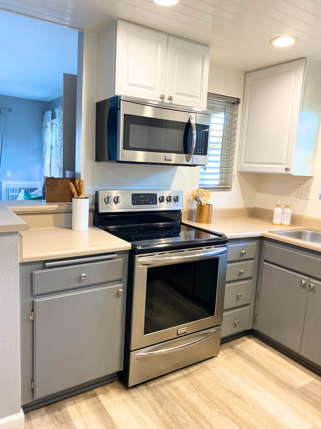 Fully stocked kitchens with utensils, pots & pans, dishware, etc. - 220 Woodland Pky Unit 250