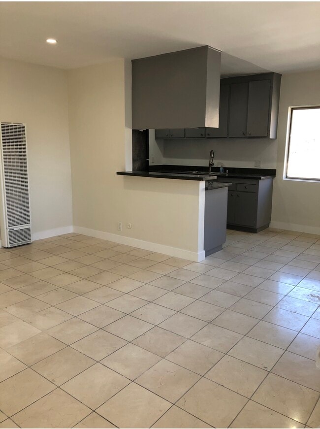 Building Photo - 11710 Otsego St Unit 7