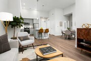 Apartments with hard surface flooring in kitchen, living, and dining areas - Avalon Monrovia Apartments