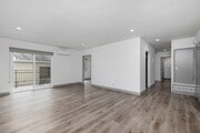 2BD, 1BA - 1,100SF - Living Room - 1408 Barry Ave Apartments