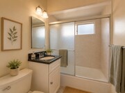 Photo - Cozy Two Bedroom Duplex w/ Hardwood Floors! Lovely Kitchen! Lots of Natural Light!