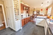 Built in wine rack and stemware racks. - 1327 S Sycamore Ave Townhome
