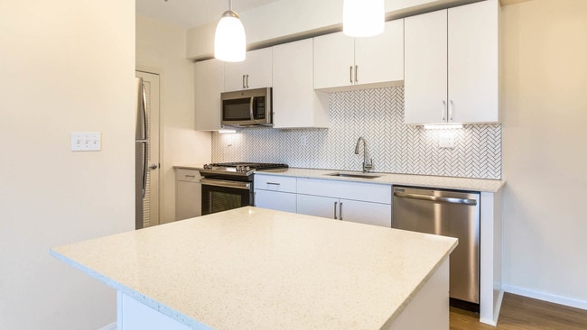 Kitchen with Stainless Steel Appliances - The Reserve at Empire Lakes