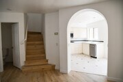 Kitchen and Stairway - 12613 El Camino Real Townhome