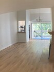 Bright living and dining areas with vaulted ceilings and private balcony - 8305 Summertime Ln Unit 8305