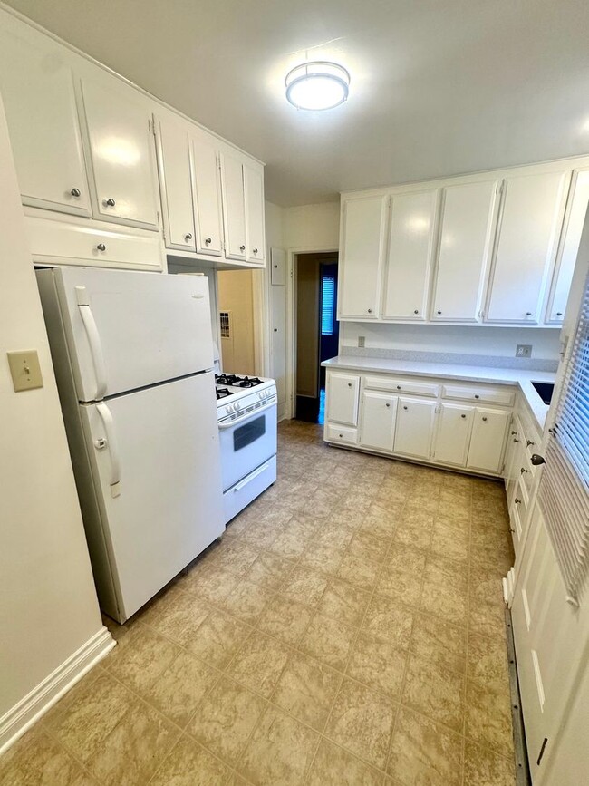 Photo - Charming 2-Bedroom Home with Hardwood Floors & Fireplace Near the Traffic Circle Unit 4512 E 15th St