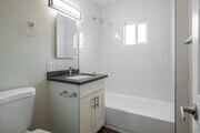 2BR, 2BA - 1,000SF - Bathroom - La Pat Courtyard Apartments
