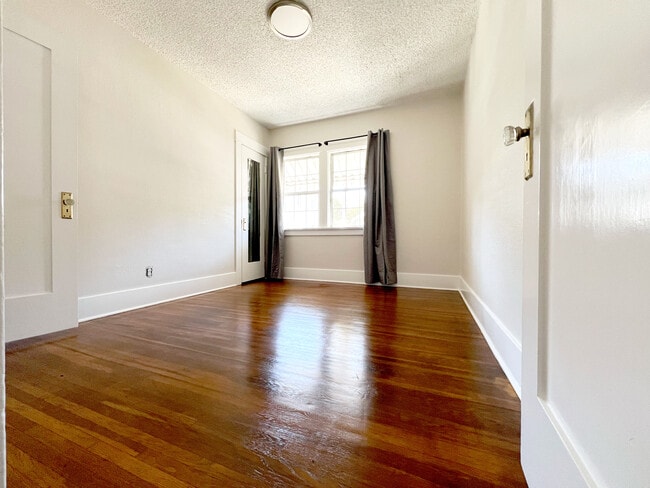 Completely refurbished hardwood floors. - 1817 E 8th St