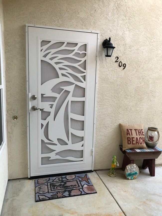 Beautiful NEW Entry Door - 555 Lands End Way Condo Unit 209