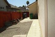Photo - Spacious single-level home located on a quiet corner lot in a well-established Oceanside neighbor...